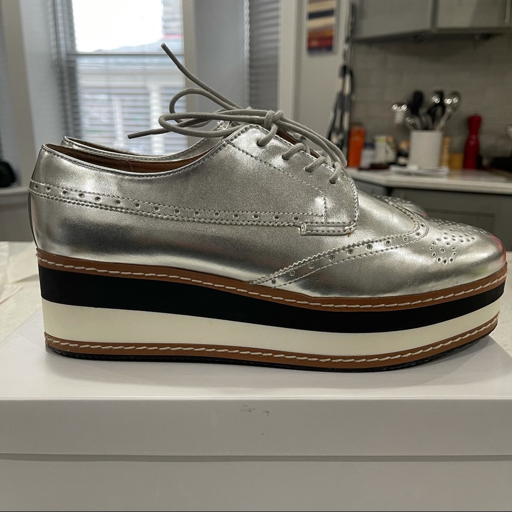 Steve Madden Silver Platforms.